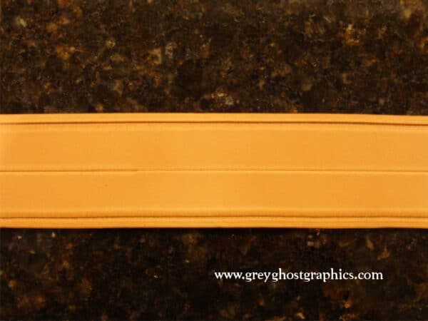 Leather Strip with Borderlines cut and bevelled.