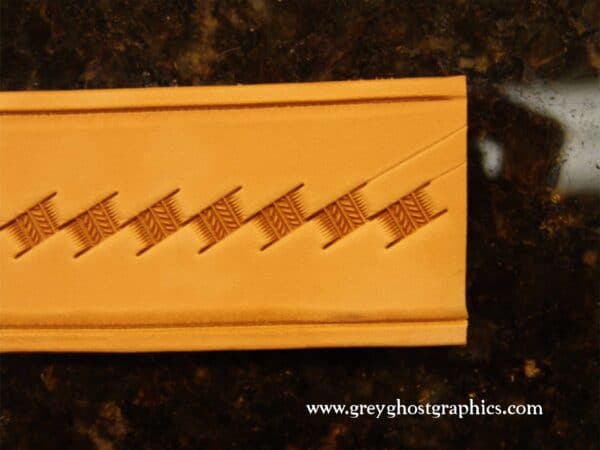 Additional guidelines scribed to begin the second row of stamping.