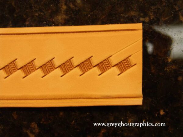 Additional guidelines scribed to begin the second row of stamping.