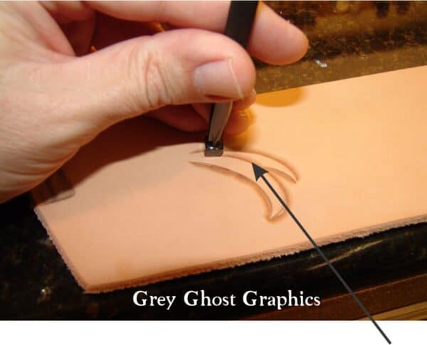 Tool is leaned away from the end of the beveled line to avoid a tool mark.